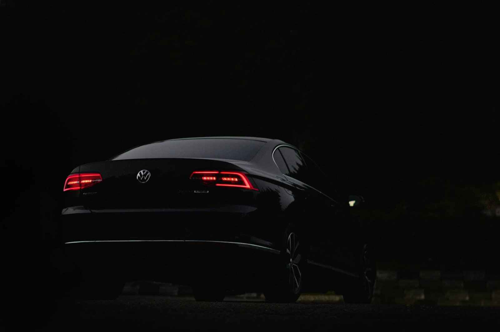 Volkswagen taillights glowing red at night